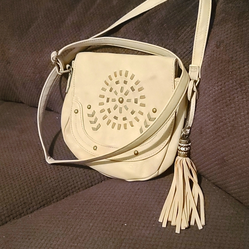 Beautiful design cream purse.